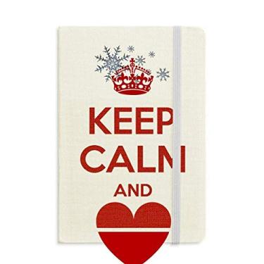 Imagem de Caderno vermelho Keep Calm And Love com citação em flocos de neve para inverno