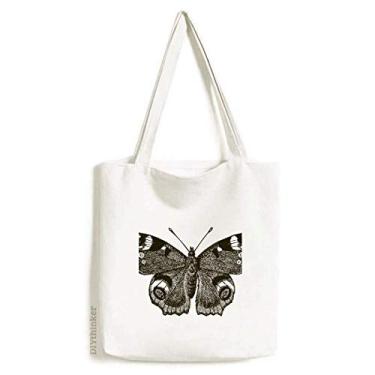 Imagem de Borboleta com asas escuras, cor escura, sacola de compras, bolsa casual