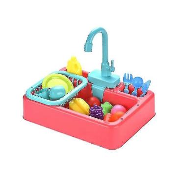 Imagem de Máquina de lavar louça das crianças brincando com brinquedos de água da torneira, cozinha s