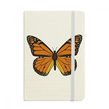 Imagem de Espécime de borboleta em caderno laranja capa dura oficial de tecido diário clássico