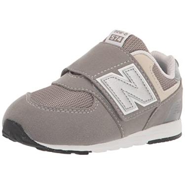 Imagem de New Balance Tênis infantil unissex 574 New-b V1 Hook and Loop, Nuvem de chuva/prata metálico, 7 Toddler