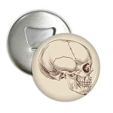 Imagem de Abridor de garrafas com desenho de perfil de crânio humano, emblema multifuncional