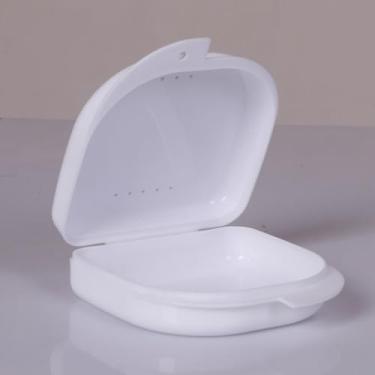 Imagem de Caa de aparelho ortodôntico cavidade oral com caa de retentor ortodôntico dentaduras colocadas caa de armazenamento dental meia boca