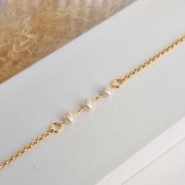 Imagem de Pulseira infantil três corações folheado em ouro 18k - Use Lírios Joia