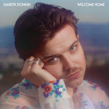 Imagem de https://webami.aent.com/welcome-home-evergreen/617308054729#:~:text=Welcome%20Home%20%2D%20Evergreen,Colored%20Vinyl%2C%20Green)