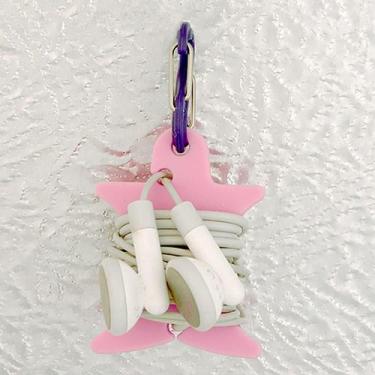Imagem de Suporte Curvyman Para Enrolar Fone De Ouvido Rosa Nite Ize