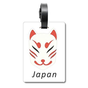 Imagem de Bolsa tradicional japonesa de cabeça de raposa local com etiqueta para cartão de bagagem