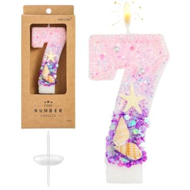 Imagem de PHD CAKE Número 7 velas roxas de aniversário na praia, celebração de festa