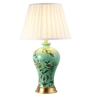 Imagem de Abajur de cabeceira em estilo chinês com flores e pássaros pintados, feito de porcelana Jingdezhen, com cúpula de tecido, ideal para leitura no quarto ou escritório.