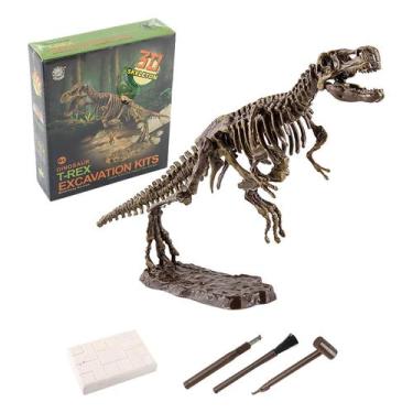 Imagem de Brinquedos luminosos escavados mão do dinossauro e esqueletos arqueoló