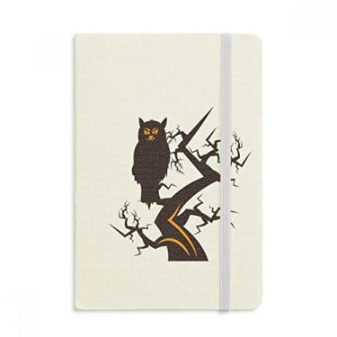Imagem de Caderno de Halloween com estampa de coruja com olhos de árvores, capa dura em tecido