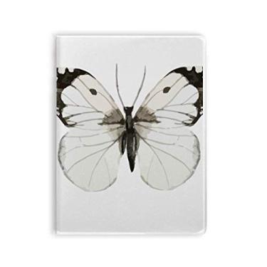 Imagem de Caderno de capa macia com borboleta com asas escuras brancas