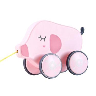 Imagem de O motorista do brinquedo do arrasto das crianças puxa a corda para pux
