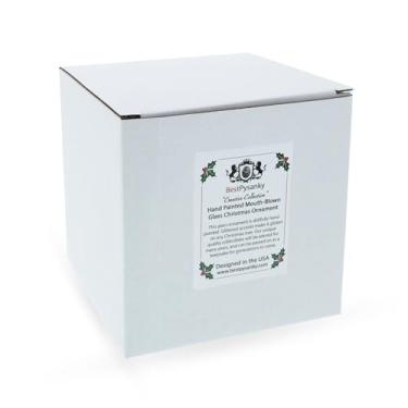 Imagem de Enfeite de Natal com acabamento de carrossel vermelho