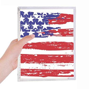Imagem de Caderno de anotações de folhas soltas e listras, com a bandeira dos Estados Unidos