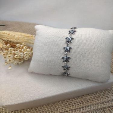 Imagem de Pulseira Tartarugas Sequência Prata 925