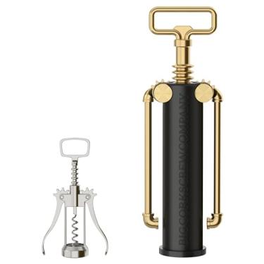 Imagem de Saca-rolhas extragrande original - um abridor para suas garrafas de vinho, uma peça central para sua mesa. Grande empresa saca-rolhas. Saca-rolhas preto fosco de alumínio com braços de latão. Um