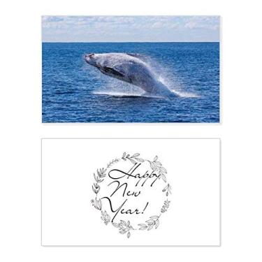 Imagem de Cartão de felicitações com mensagem de abençoada e presente de ciência da natureza do oceano jubarte