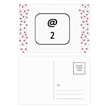 Imagem de Símbolo de teclado 2 cartões postais de Natal para celebração de flores