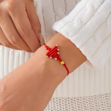 Imagem de Pulseiras de Natal empilhadas com berloques de Natal, pulseiras, presentes, decorações de árvores, roupas femininas