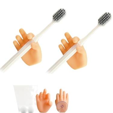 Imagem de 2 peças de suporte de escova de dentes para pendurar, ganchos de sucção utilitários para pendurar na parede com adesivos, multifuncional, design de mão pequena, decoração de banheiro, porta-chaves,