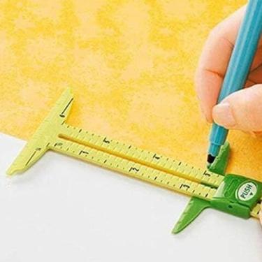 Imagem de Ferramenta de régua de medição de medidor deslizante 5 em 1 para costura, artesanato, marcação de furos de botão, medidor de bainha, bússola circular, medidor T