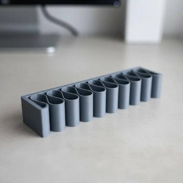 Imagem de suporte organizador universal  para cabos de carregamento usb