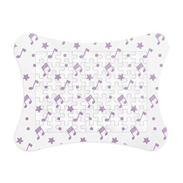 Imagem de Moldura de quebra-cabeça de papel com pequenas estrelas roxas e notas musicais para casa