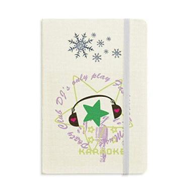 Imagem de Caderno musical verde de cinco pontas, com sons de estrelas, flocos de neve, inverno
