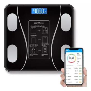 Imagem de Controle de IMC na palma da mão com balança digital. - CENTER