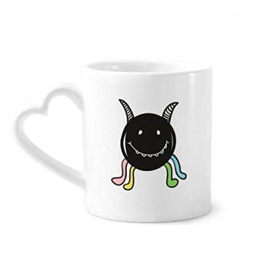 Imagem de Caneca de café de cerâmica com sorriso do universo e alienígena copo de coração de vidro