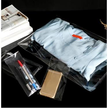 Imagem de 100 sacos plásticos transparentes de celofane autovedante para roupas, festas, casamentos (transparentes)