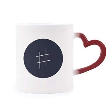 Imagem de Caneca preta sensível ao calor com assinatura White Music vermelha que muda de cor