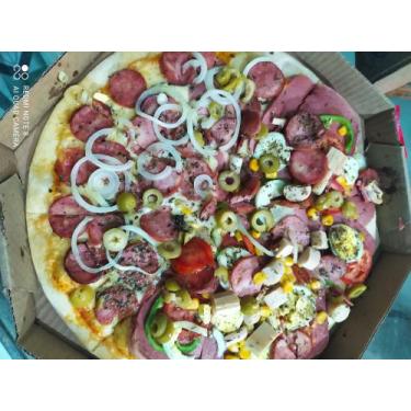 Imagem de Pizza de calabresa com português - Pizzaria dona da borda