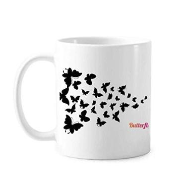 Imagem de Borboletas com cor escura, caneca de cerâmica e porcelana de café