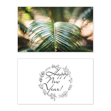 Imagem de Imagem de planta de folhas verdes natureza festival ano novo cartão felicitações mensagem presente