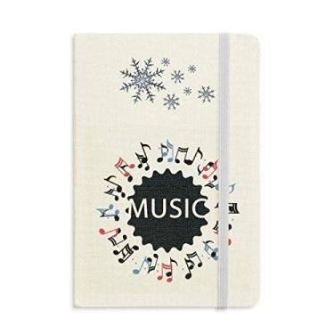 Imagem de Caderno de notas musicais em formato redondo azul vermelho grosso flocos de neve inverno