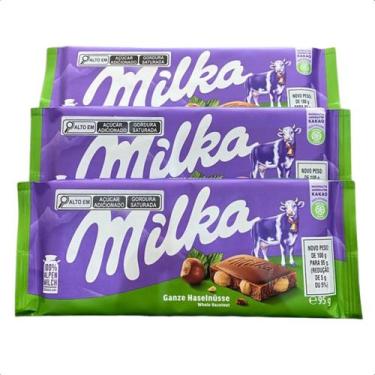 Imagem de 3 barras de chocolate milka importado com avelâs inteiras