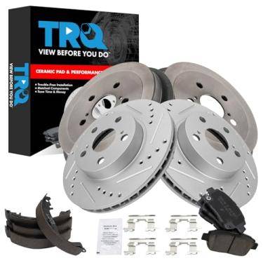 Imagem de TRQ Pastilha de freio dianteiro e traseiro e rotor, kit de sapata e tambor Desempenho de cerâmica revestido com G premium compatível com Toyota Prius 2009