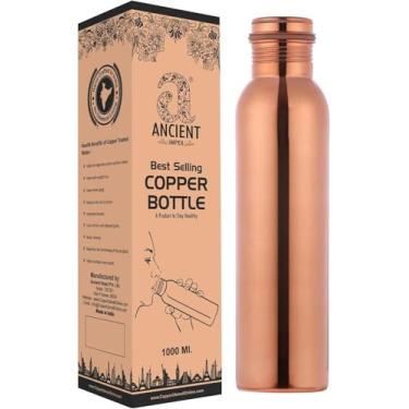 Imagem de ANCIENT IMPEX Garrafa de cobre para água potável de 1000 ml (33,84 US FL Oz) Capacidade sem junta para benefício de saúde Ayurveda feita de cobre puro, sem forro, sem revestimento e não laqueado