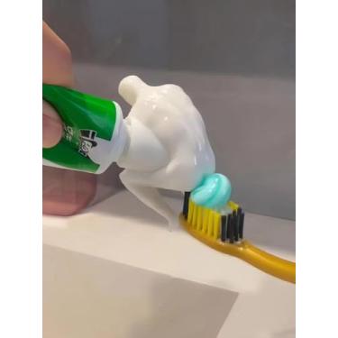 Imagem de Espremedores de pasta de dente, tampas de pasta de dente, pequenas coisas engraçadas