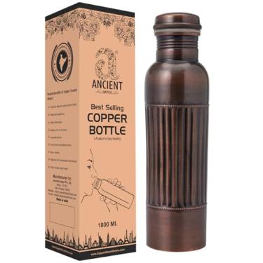 Imagem de ANCIENTIMPEX Garrafa de água de cobre puro 950 ml – Acabamento antigo premium com padrão de forro | Benefícios para a saúde Ayurveda, à prova de vazamento, garrafa de cobre ecológica para hidratação