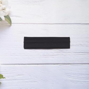 Imagem de Faixa de cabelo elástica esportiva preta absorvente de suor antiderrapante para corrida, ioga e fitness