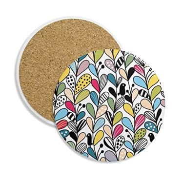 Imagem de Caneca com desenho de folhas de coração e porta-copos com proteção de mesa, pedra absorvente