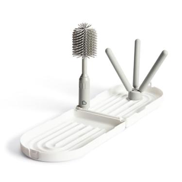 Imagem de Munchkin® Suporte para secagem de mamadeiras de viagem com escova de silicone – compacto e dobrável, cabe facilmente em bolsas de fraldas para uso em movimento