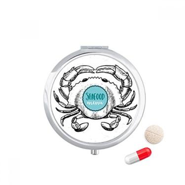 Imagem de Estojo de comprimidos para ilustração de organismo marinho com desenho de caranguejo