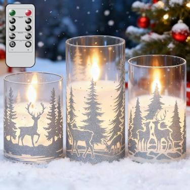 Imagem de KunSwenn Velas de Natal sem chama com decalques prateados de rena, pacote com 3 velas de vidro LED operadas por bateria com temporizador remoto, velas de coluna com padrão de cervo e cipreste para