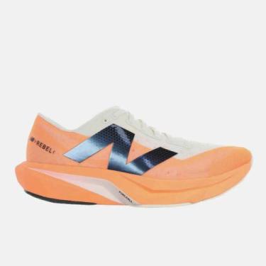 Imagem de Tênis New Balance Masculino FuelCell Rebel v4, 39BR, Laranja, Creme
