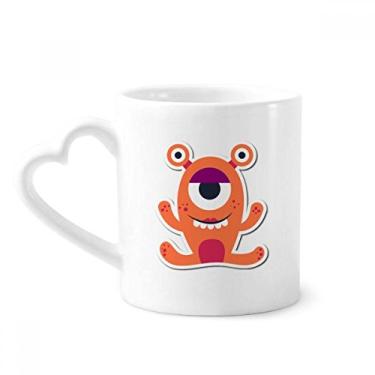 Imagem de Caneca de café de cerâmica com monstro laranja universo e alienígena copo de coração de vidro