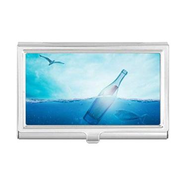 Imagem de Porta-cartões de visita com garrafa de vidro do oceano, ciência, natureza